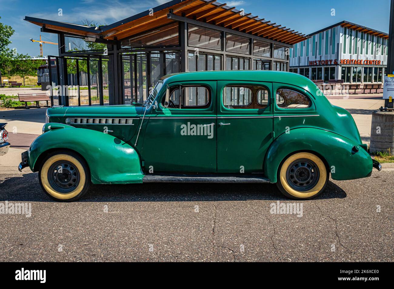 Falcon Heights, MN - June 19, 2022: High perspective side view of a 1940 Packard 110 4 Door Sedan at a local car show. Stock Photo