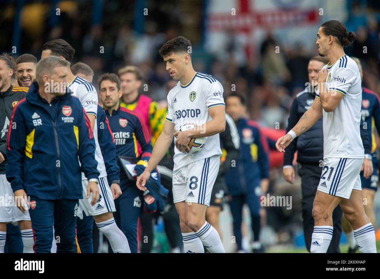 The game is delayed and players taken back off the pitch as the stadium