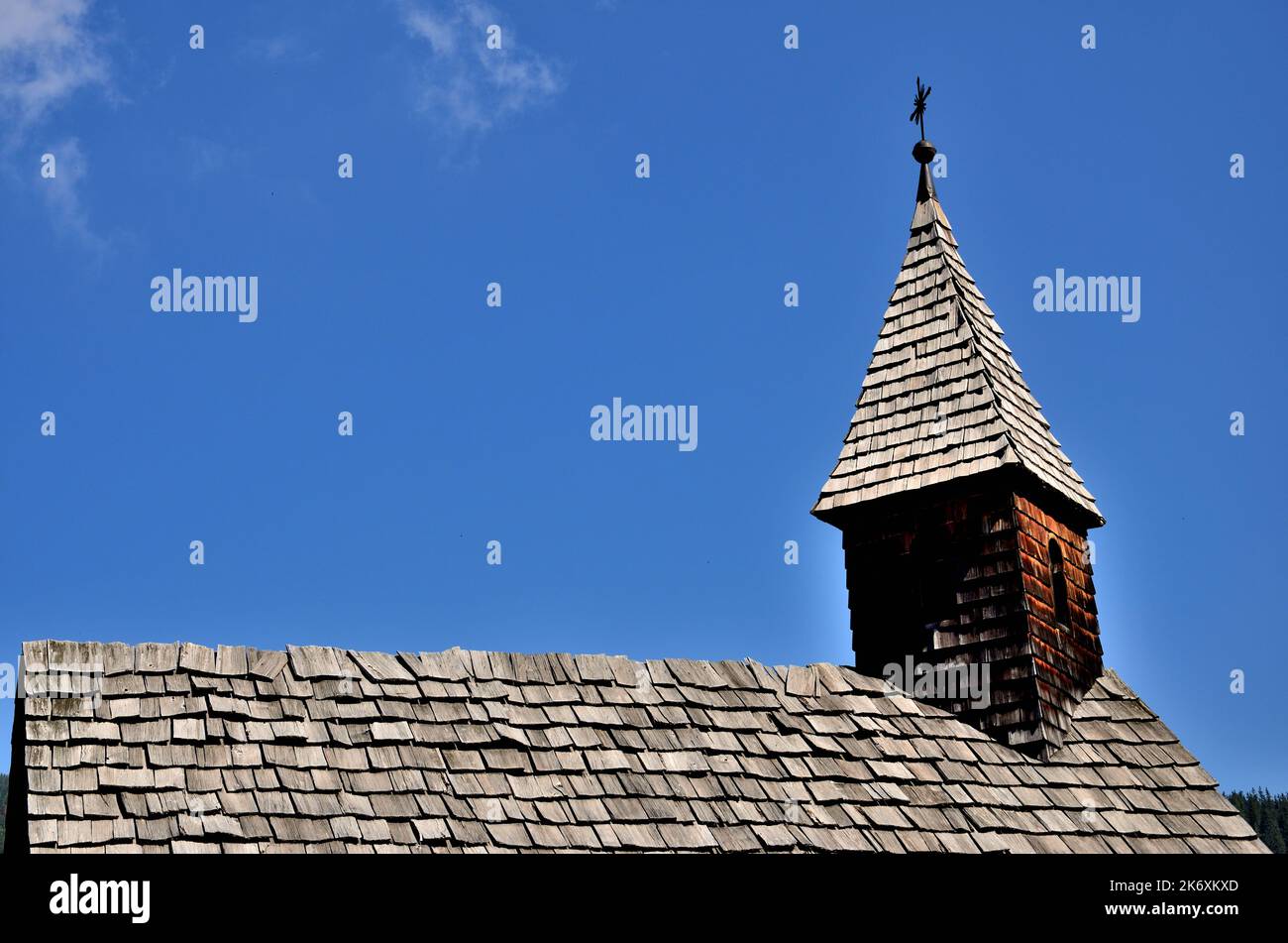 Shingle roof of a chapel in the woods of the Braies valley Stock Photo