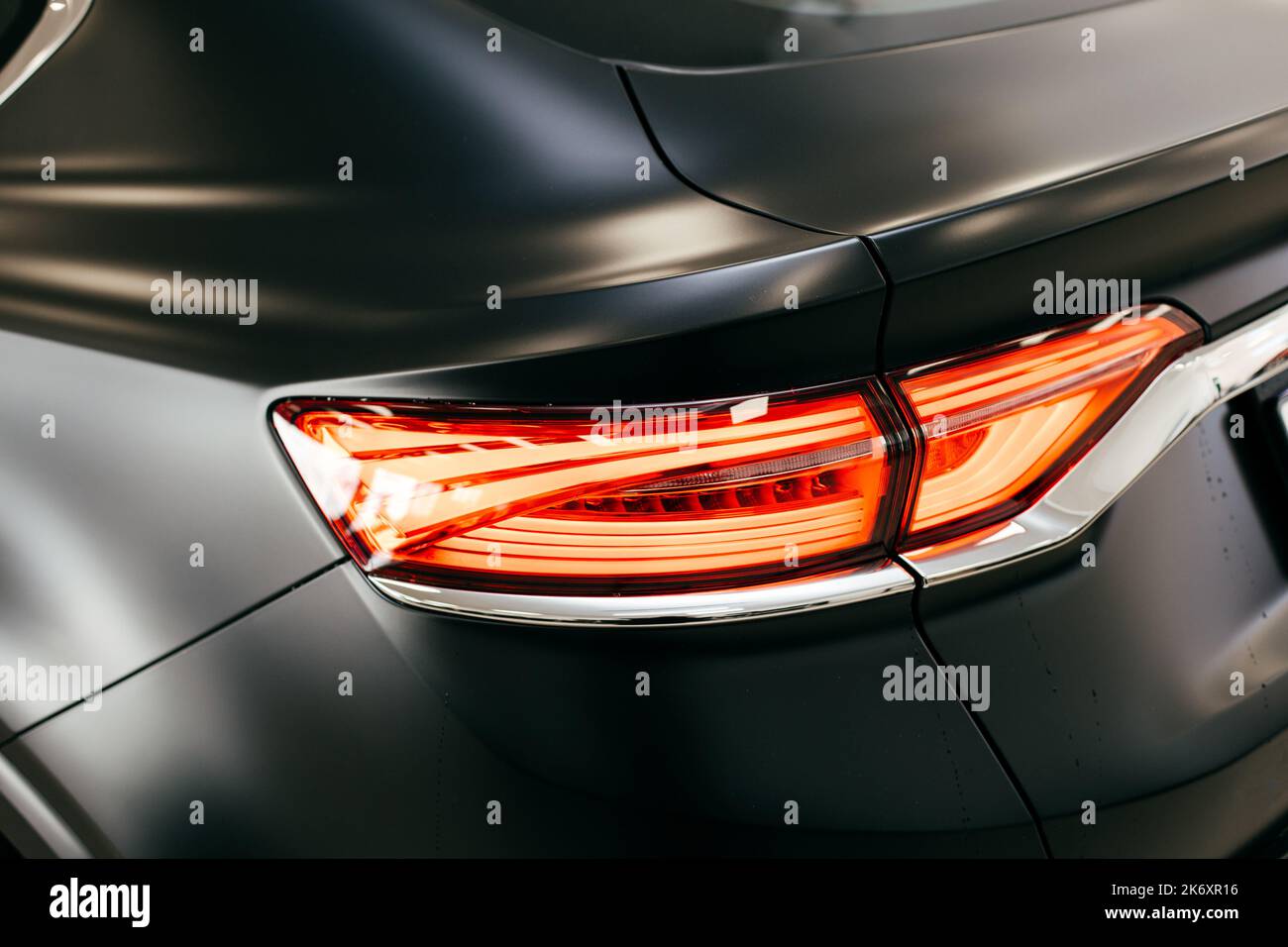 Black car headlight close up, beautiful car design Stock Photo Alamy