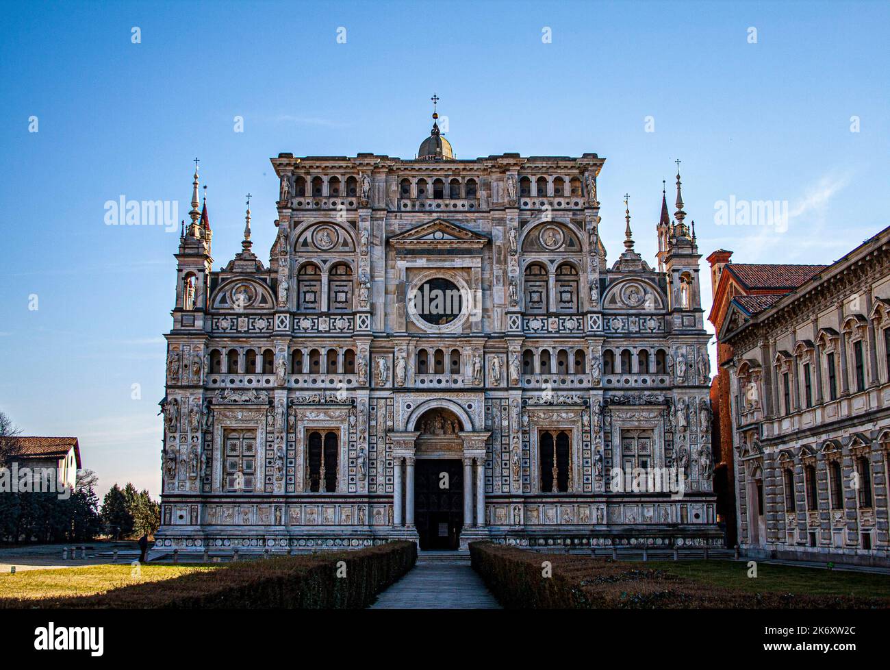 Lombardy, Italy, Europe. The Charterhouse of Pavia, in italian Certosa di Pavia (Gratiarum Carthusia - Monastery of Santa Maria delle Grazie) is a historic monumental complex that includes a monastery and a sanctuary. It is located in the homonymous municipality of Certosa di Pavia, a town some kilometers north of the provincial capital. Pavia. The facade of the church os Santa Maria delle Grazie. Stock Photo