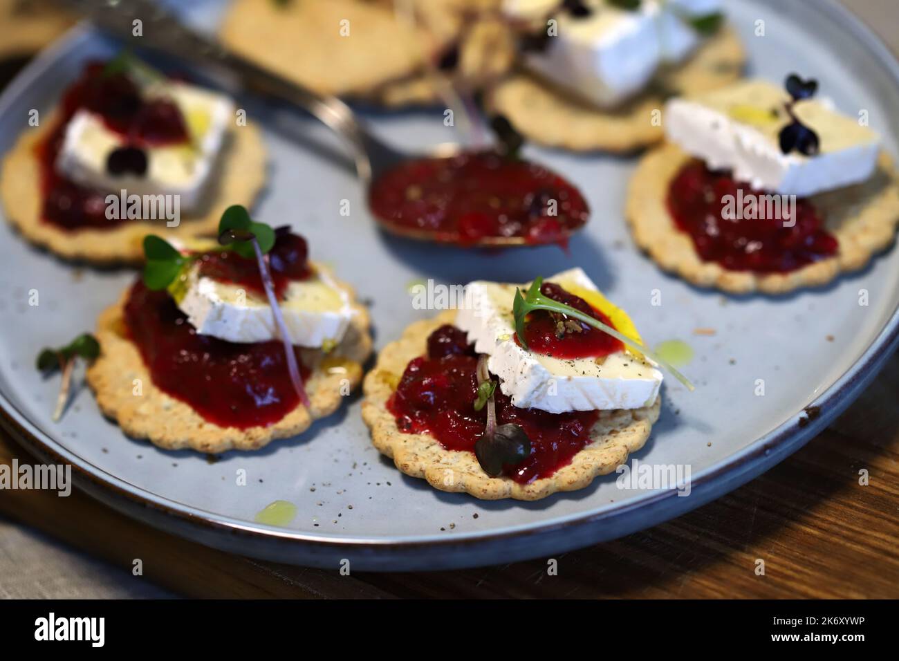 Canape with jam and brie cheese. Healthy snack Stock Photo Alamy