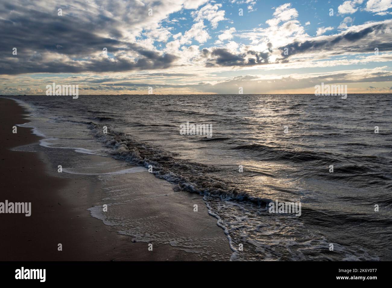 High tide on the eastern shore of the Wash at Snettisham in Norfolk. Stock Photo