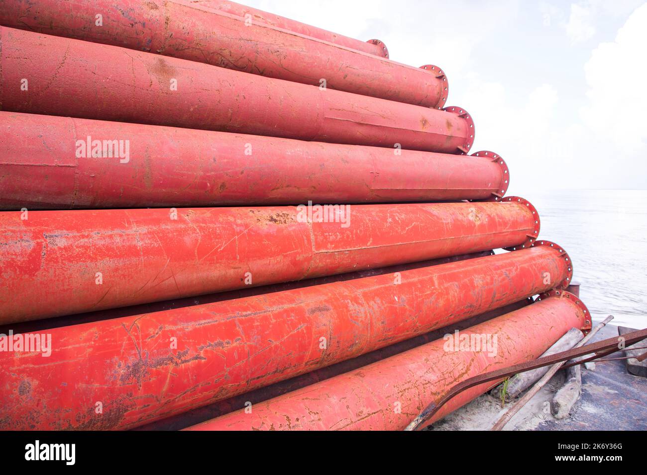 Rusted iron steel metal pipes stack an industrial field Stock Photo Alamy