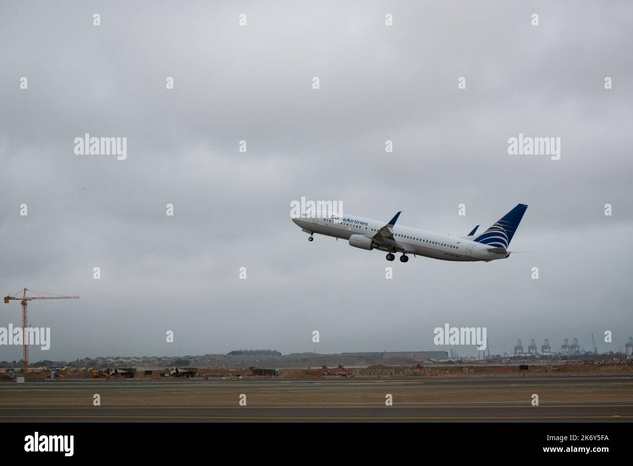 Lima, Peru - July 27 2022: Plane Taking off from the Airport on a Cloudy Day Stock Photo