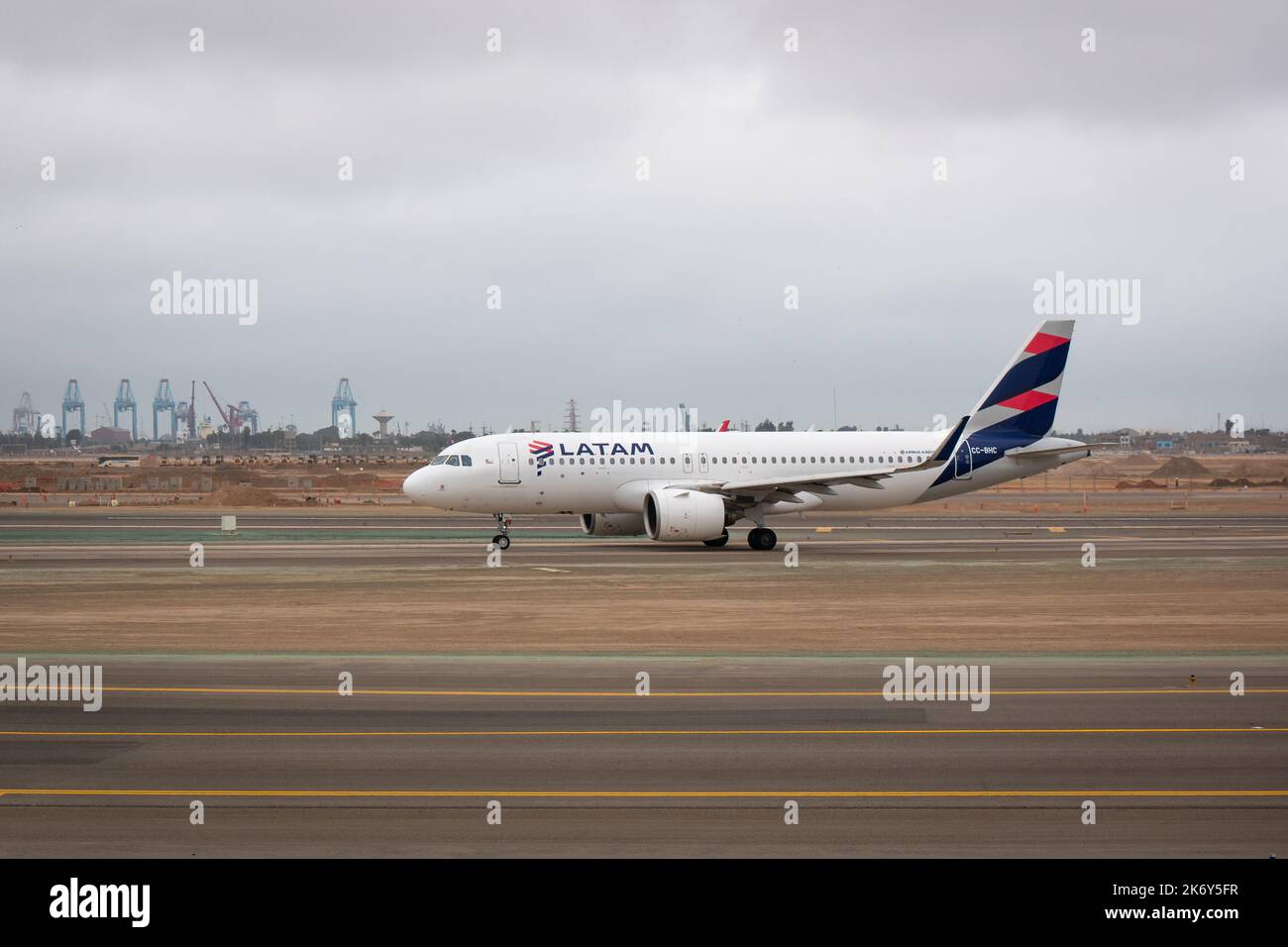Lima, Peru - July 27 2022: Plane Taking off from the Airport on a Cloudy Day Stock Photo