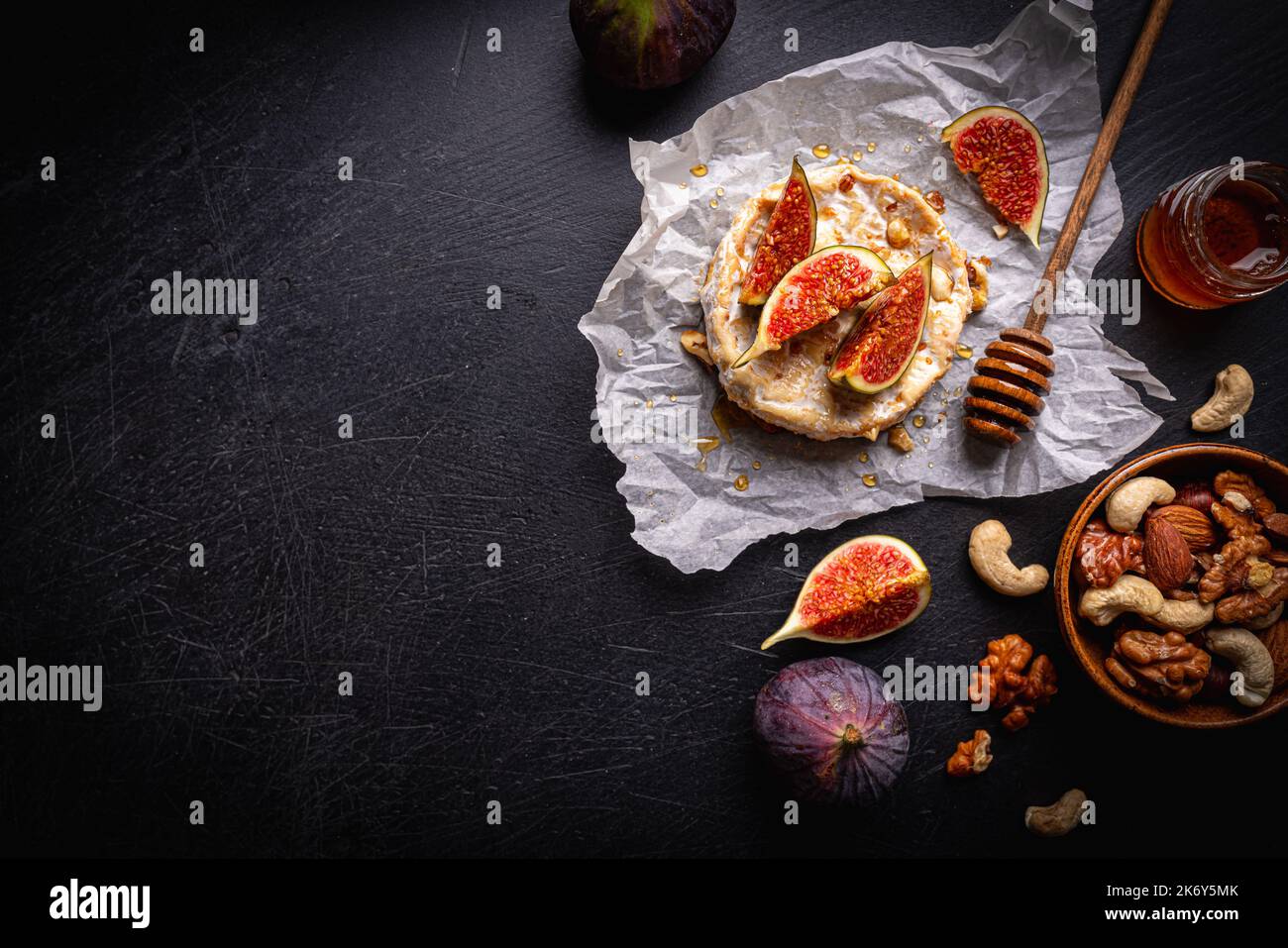 Brie cheese with fresh figs Stock Photo Alamy