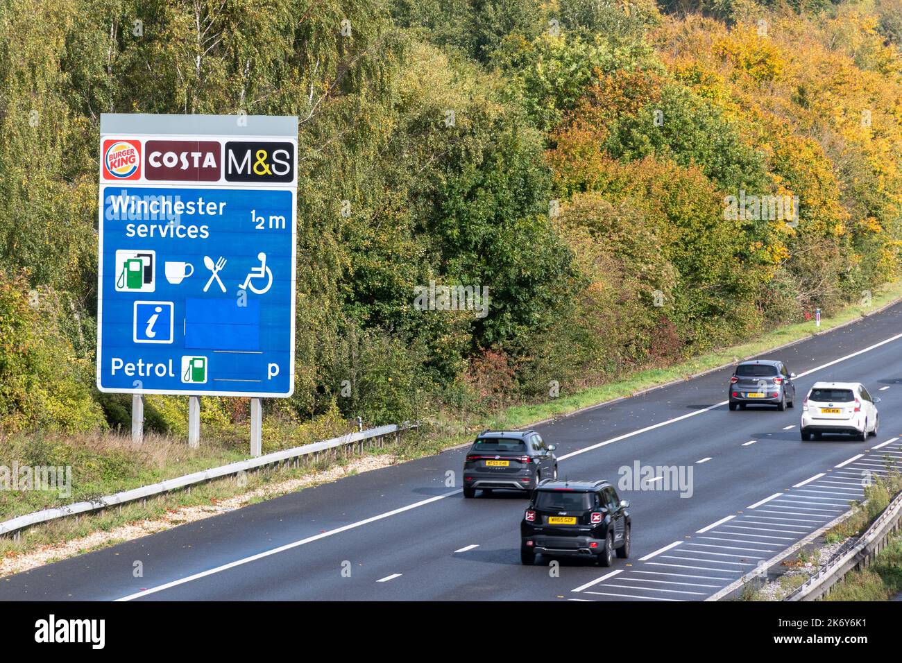 M3 motorway sign for Winchester Services in Hampshire, England, UK. Road sign and traffic near service station. Stock Photo