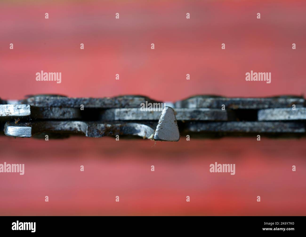 A close up of a blunt chainsaw chain. Stock Photo