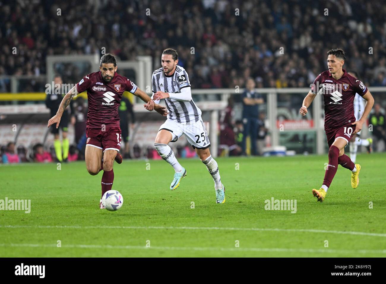 Saša Lukić of Torino FC,Ricardo Rodríguez of Torino FC,Adrien Rabiot of Juventus FC, during the Serie A match between Torino FC and Juventus FC on October, 15th, 2022 at Stadio Olimpico Grande Torino in Torino, Italy. Picture by Antonio Polia Stock Photo