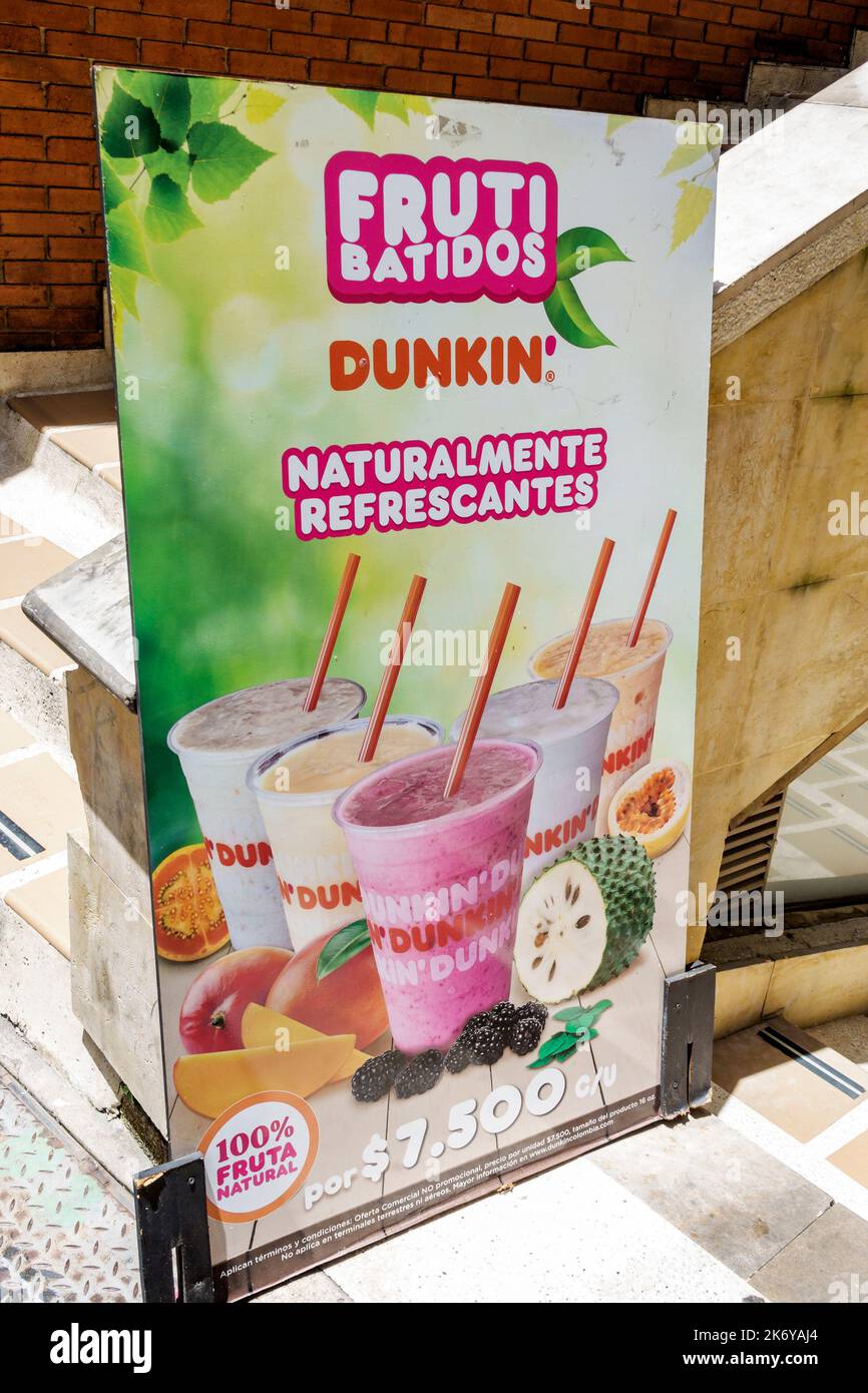 Bogota Colombia,Santa Fe Dunkin' Donuts sign billboard information promoting promotion tropical fruit smoothies Spanish language advertising,Colombian Stock Photo