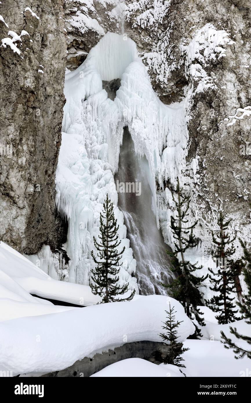 WY05101-00.....WYOMING - Frozen Fairy Falls in the Midway Geyser Basin of Yellowstone National Park. Stock Photo