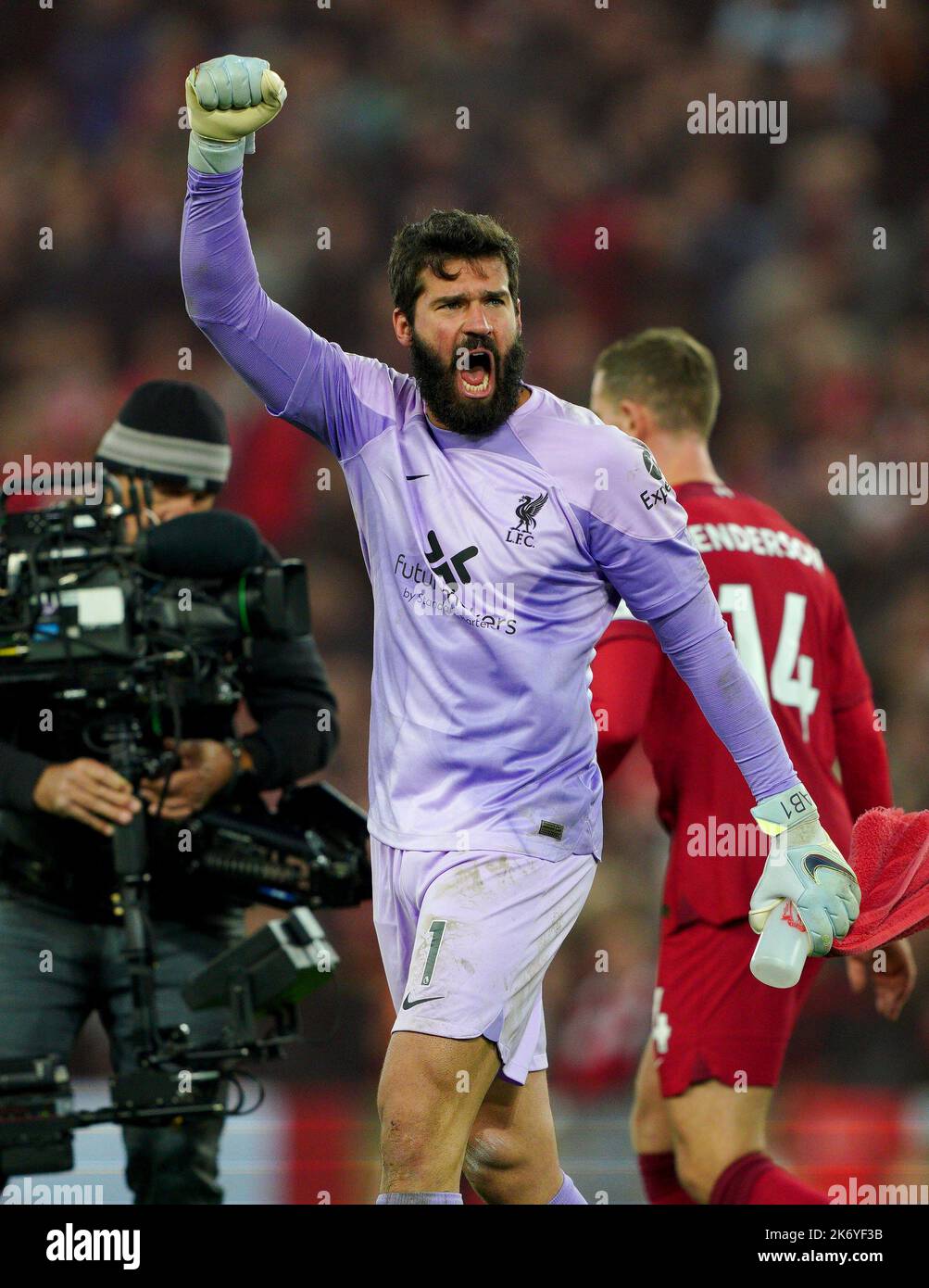 Liverpool goalkeeper Alisson Becker celebrates at full time after the ...