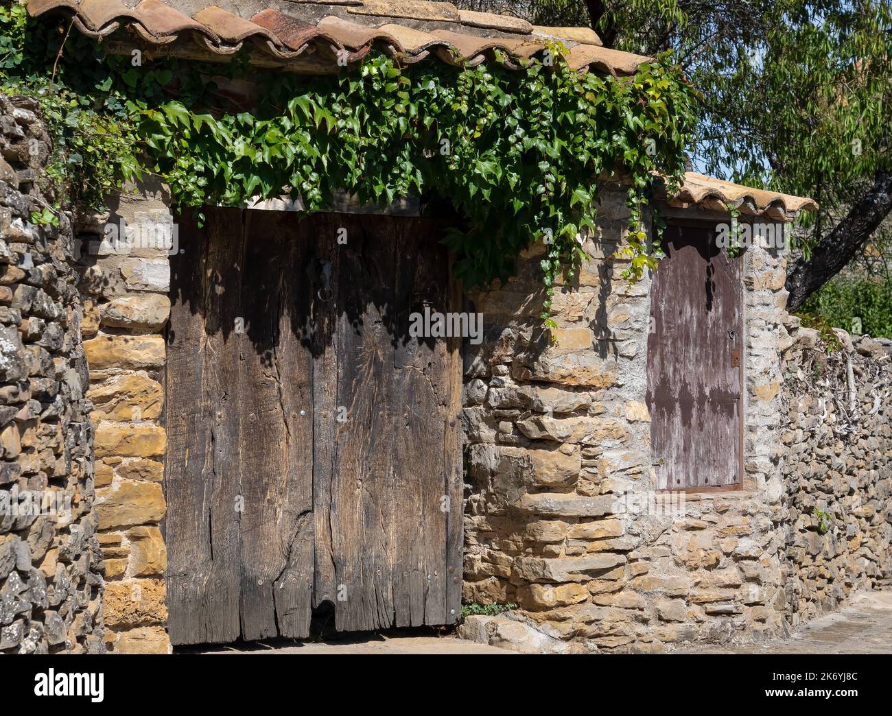 typical Spanish pyrenees dwellings built of local stone and aged