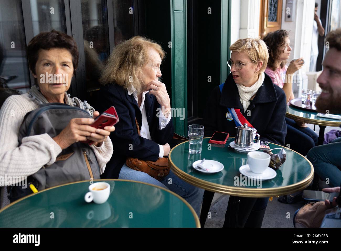 2022 Nobel Literature Prize laureate French novelist Annie Ernaux and LFI deputy Clementine Autain at the terrasse of a cafe during a rally against soaring living costs and climate inaction called by French left-wing coalition NUPES (New People Ecologic and Social Union) in Paris on October 16, 2022 Photo by Raphael Lafargue/ABACAPRESS.COM Stock Photo