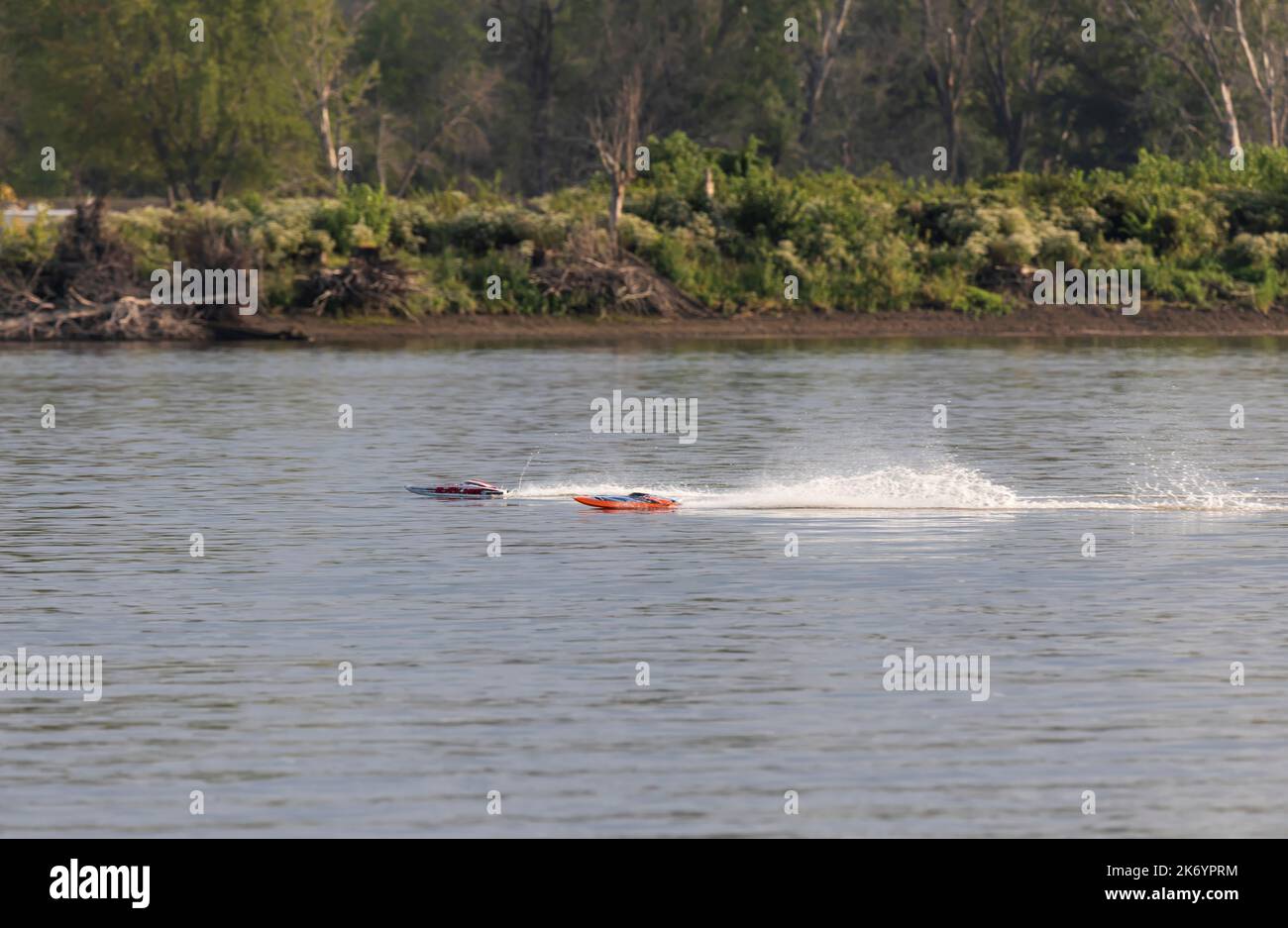 racing high speed remote controlled boats on the Mississippi River near Muscatine, Iowa Stock Photo