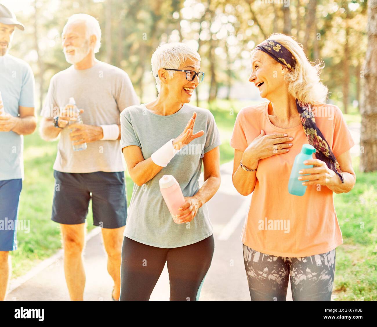 mture woman sport group Older elderly woman running runner hi-res stock photography and images -  Alamy