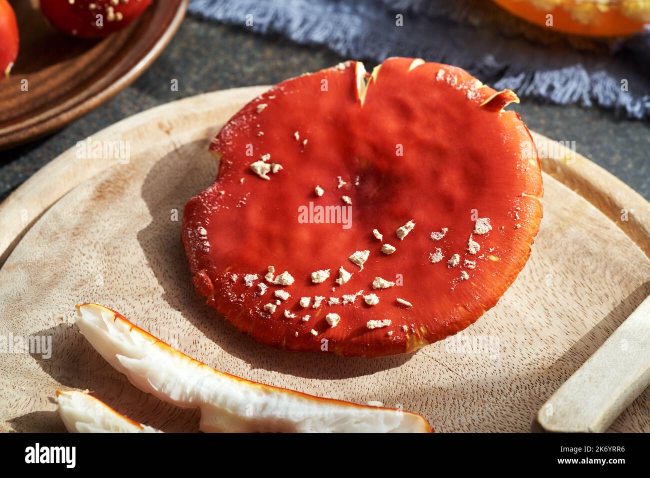 Cutting red fly agaric or amanita mushroom preparation of herbal