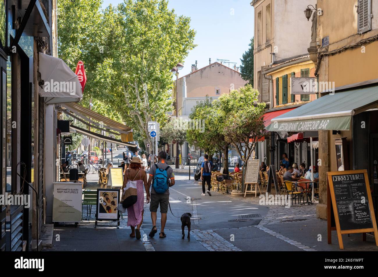 Shoppers in the old city center of Aix-en-Provence in southern France. Stock Photo
