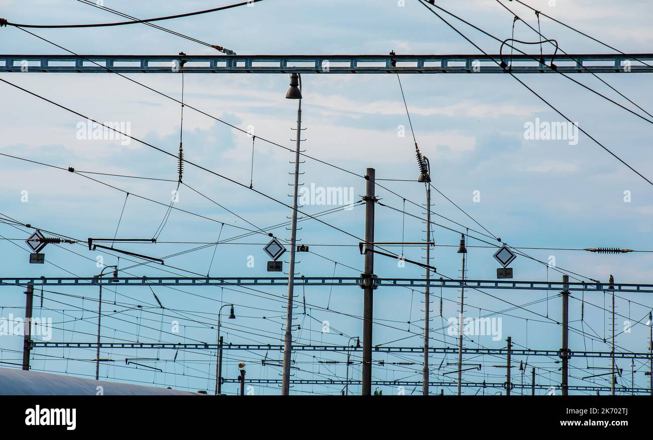 Railroad or railway overhead power lines. Contact or electric wires. Stock Photo