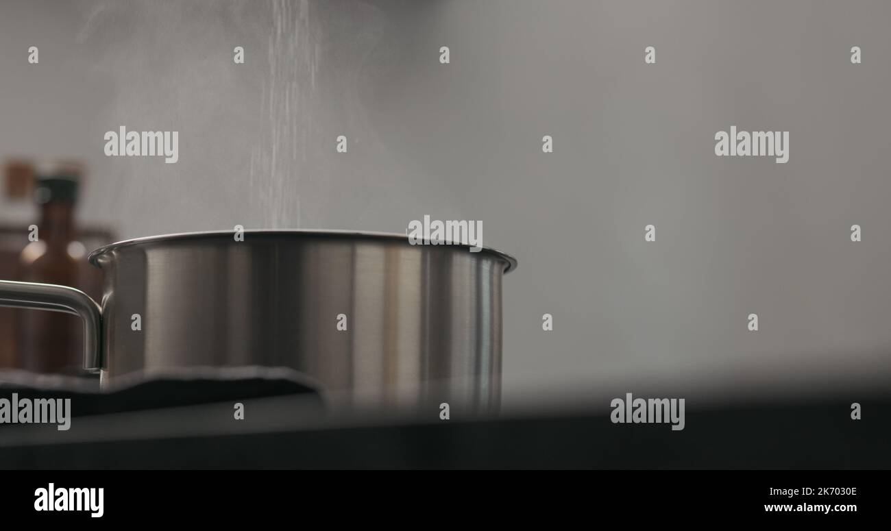 Steam rising from saucepan closeup hi-res stock photography and images ...