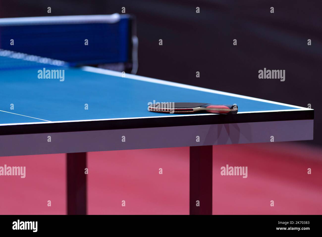 Professional blue table tennis table and racket. Horizontal sport theme ...