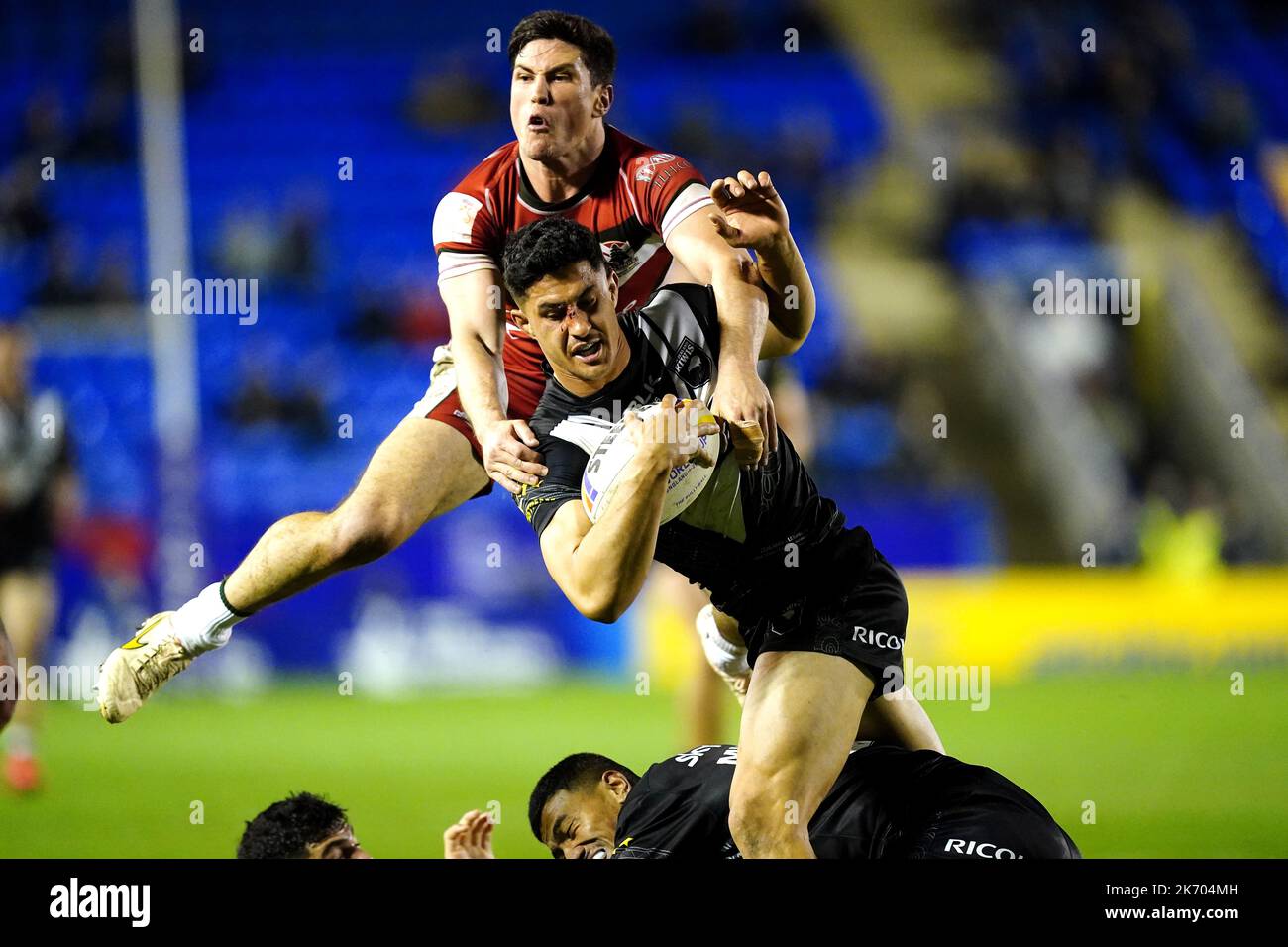 New Zealand's Dylan Brown is tackled by Lebanon's Mitchell Moses during ...