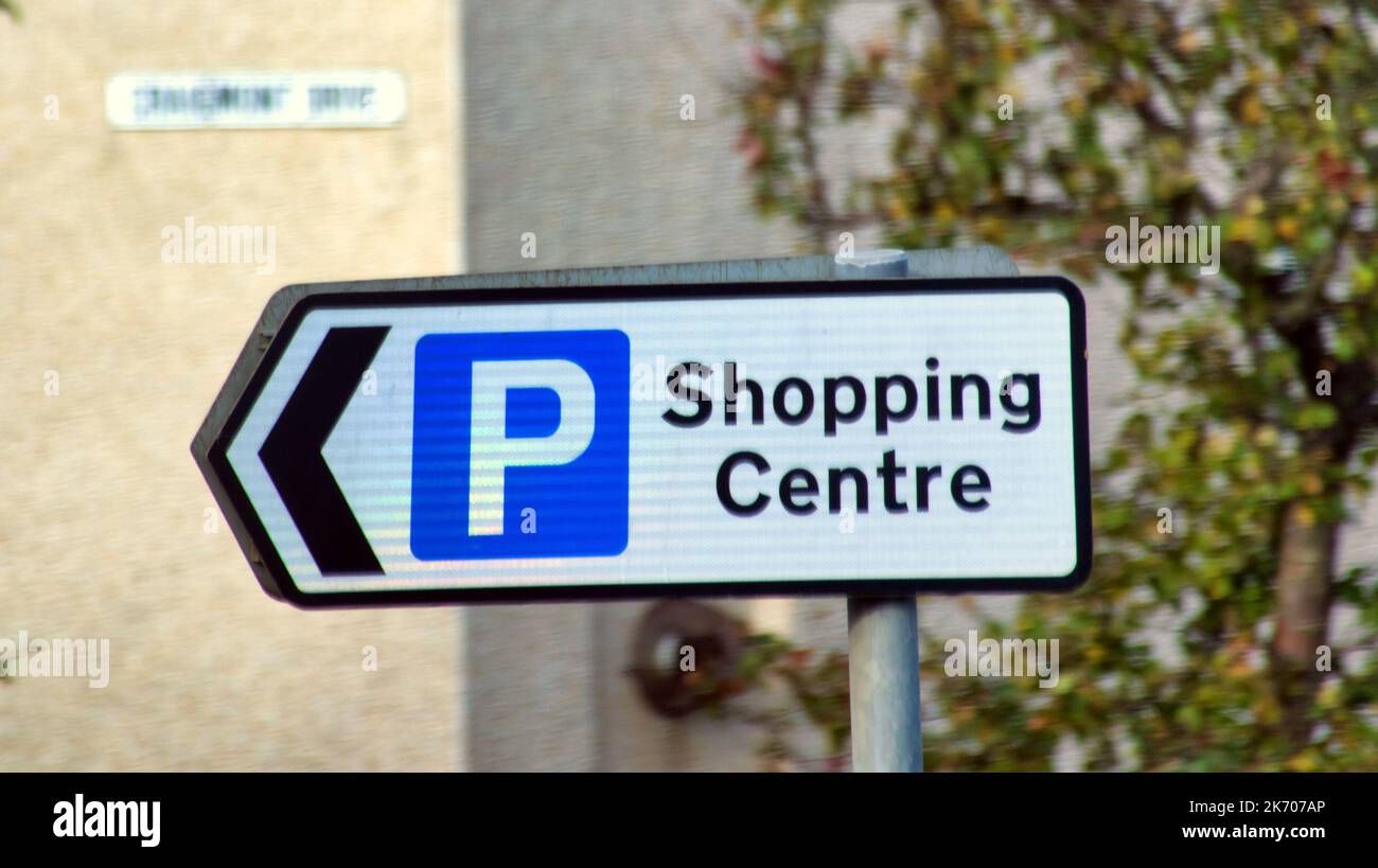 shopping centre parking sign on lamp post pole with arrow Stock Photo