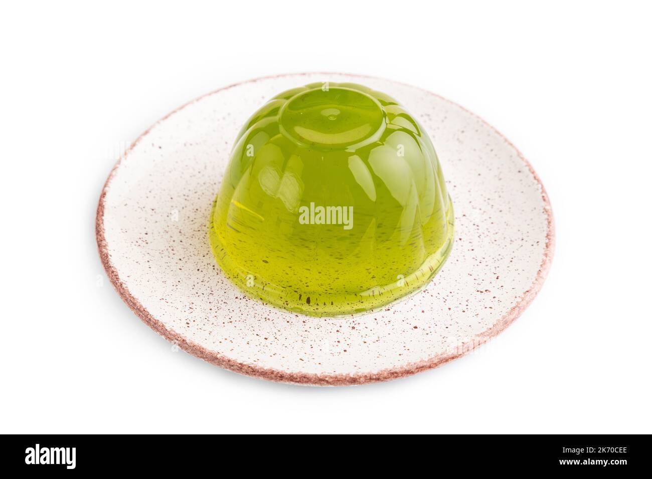 Mint green jelly isolated on white background. side view, close up
