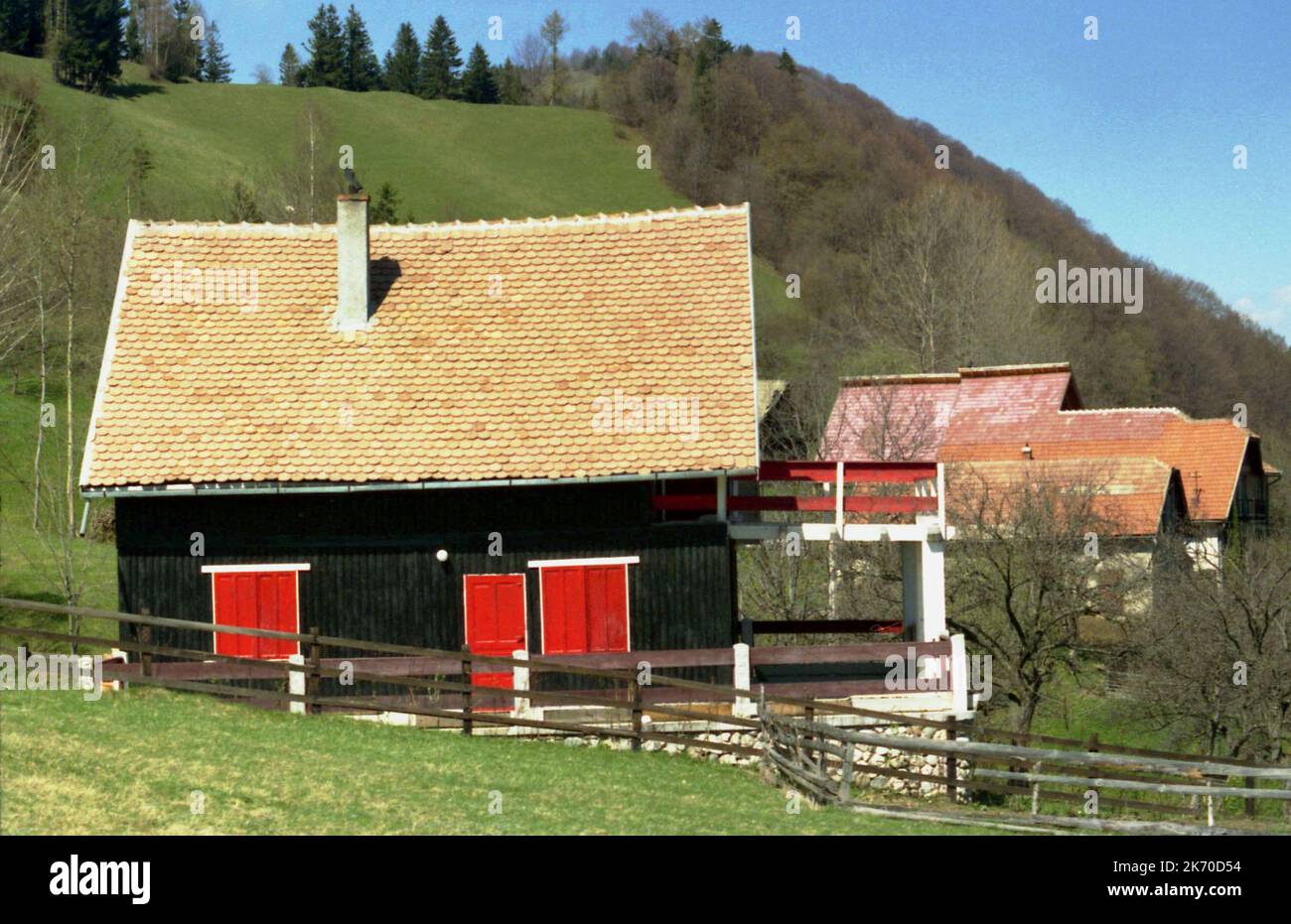 Brasov County, Romania. Small wooden house surrounded by a mountain pasture  Stock Photo - Alamy