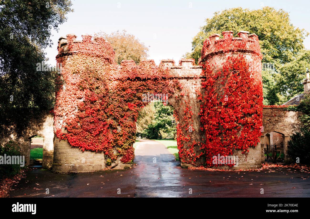English castle covered in maple leaves in the countryside Stock Photo