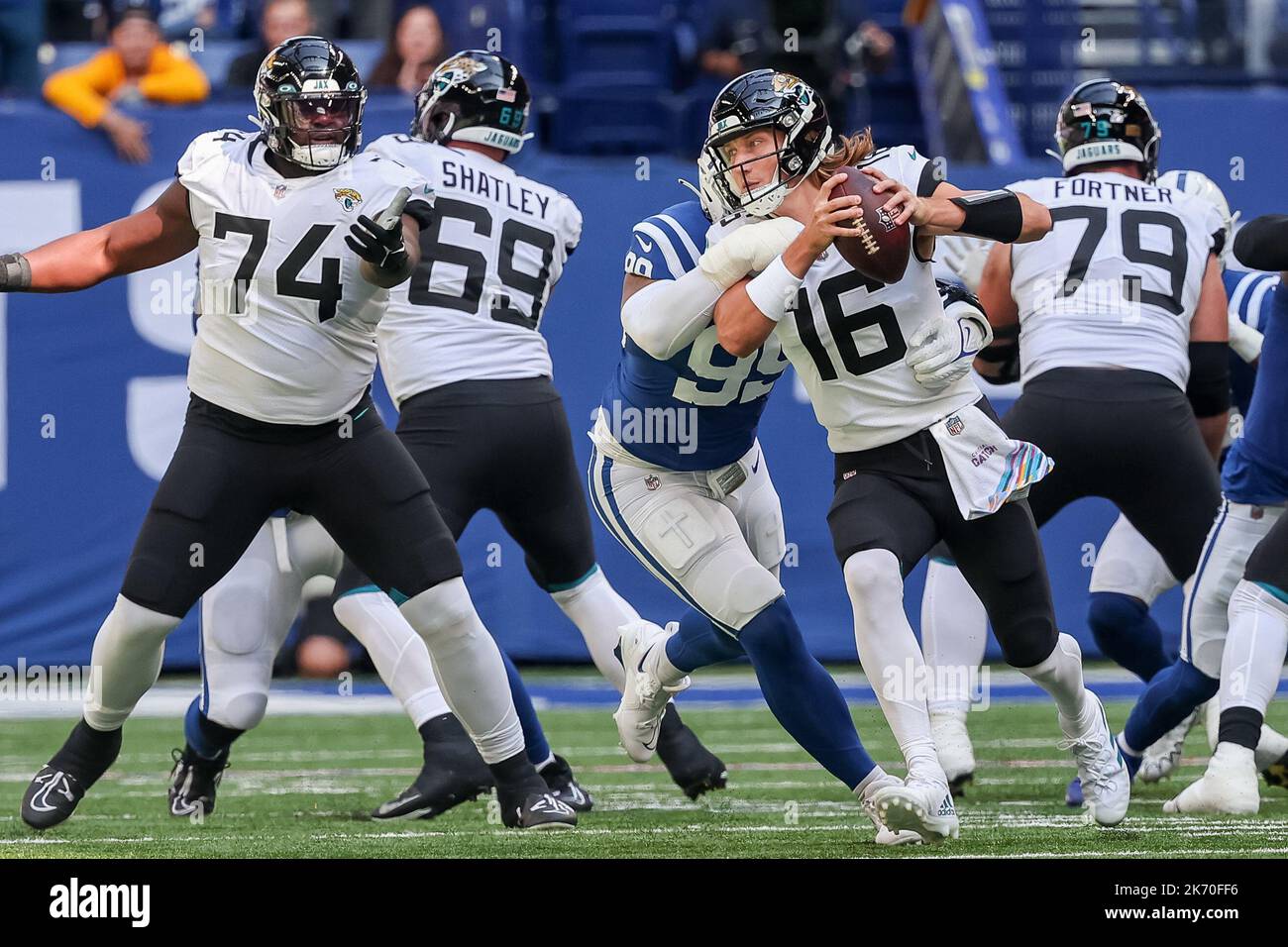 Indianapolis, Indiana, USA. 20th Nov, 2022. Philadelphia Eagles quarterback  Jalen Hurts (1) is pressured by Indianapolis Colts defensive tackle  DeForest Buckner (99) and forced out of bounds during the game between the