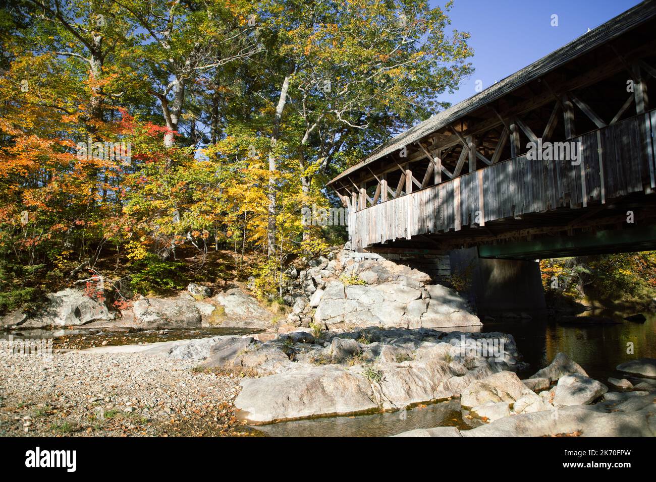 Fall color at the Sunday River Bridge, Newry, Maine Stock Photo
