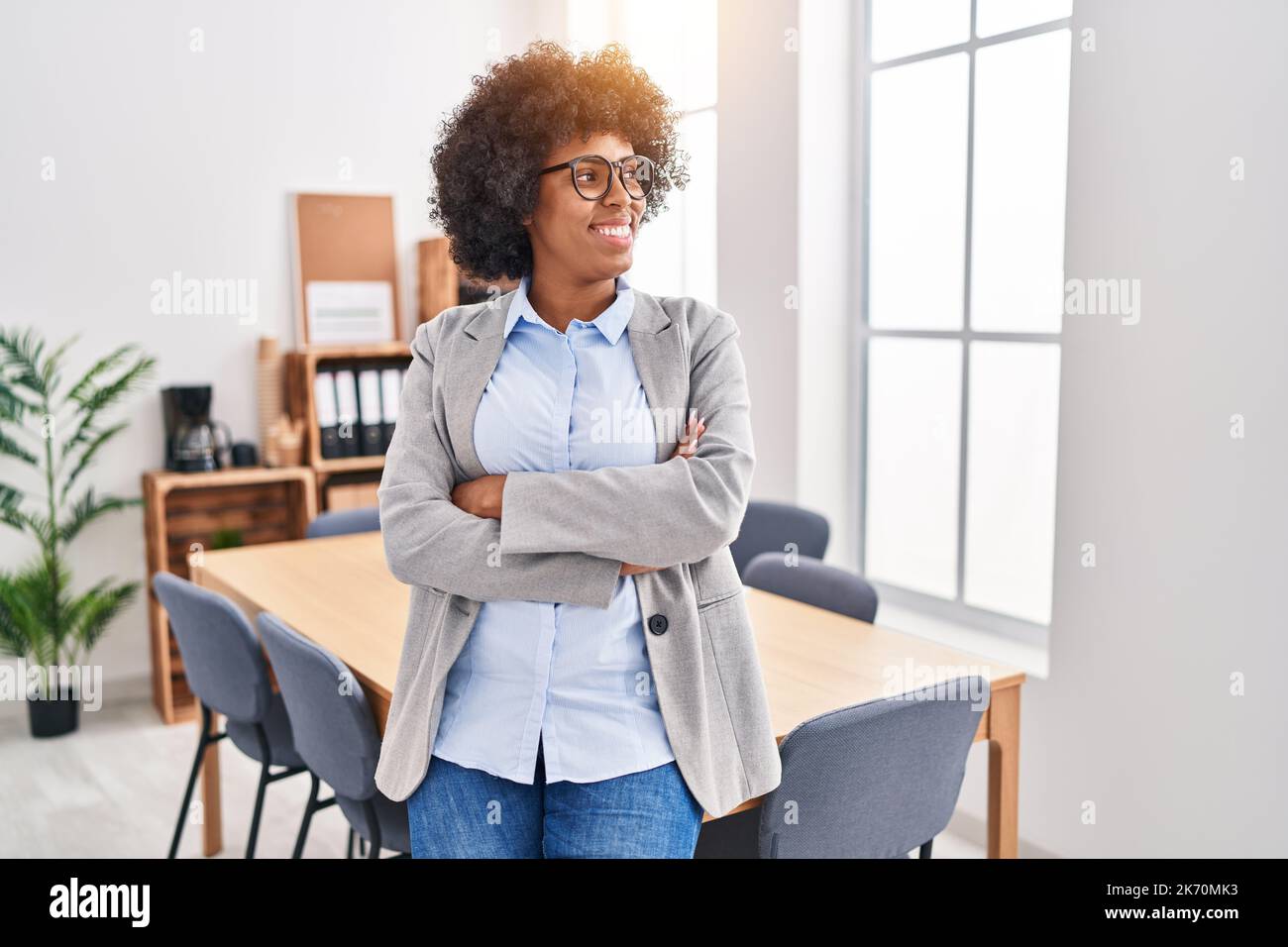 African american woman business worker smiling confident standing with ...