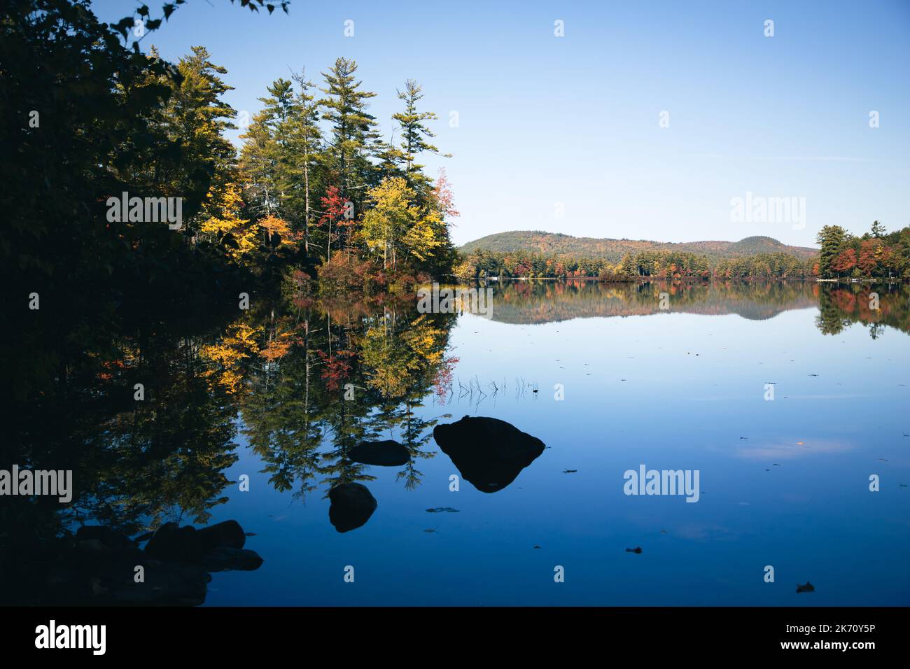 Fall foliage at Sabatis Island, Moose Pond, Bridgton, Maine Stock Photo