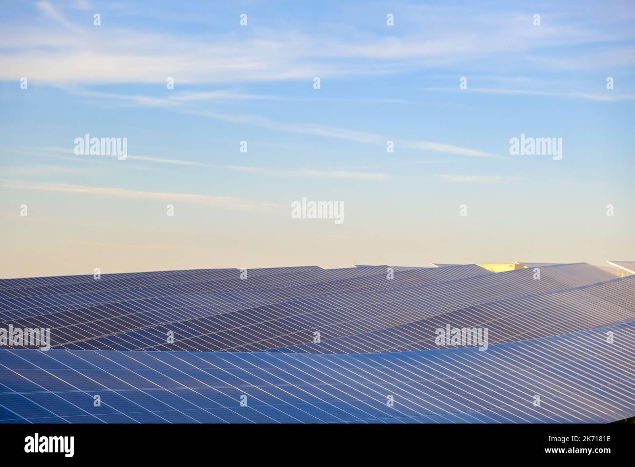 Solar panels and blue sky wallpaper.Technology and nature.renewable energy.Green energy.renewable energy from nature.solar power technology Stock Photo
