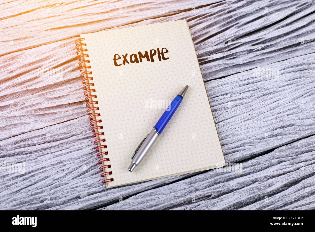 Word example on a notepad Stock Photo - Alamy
