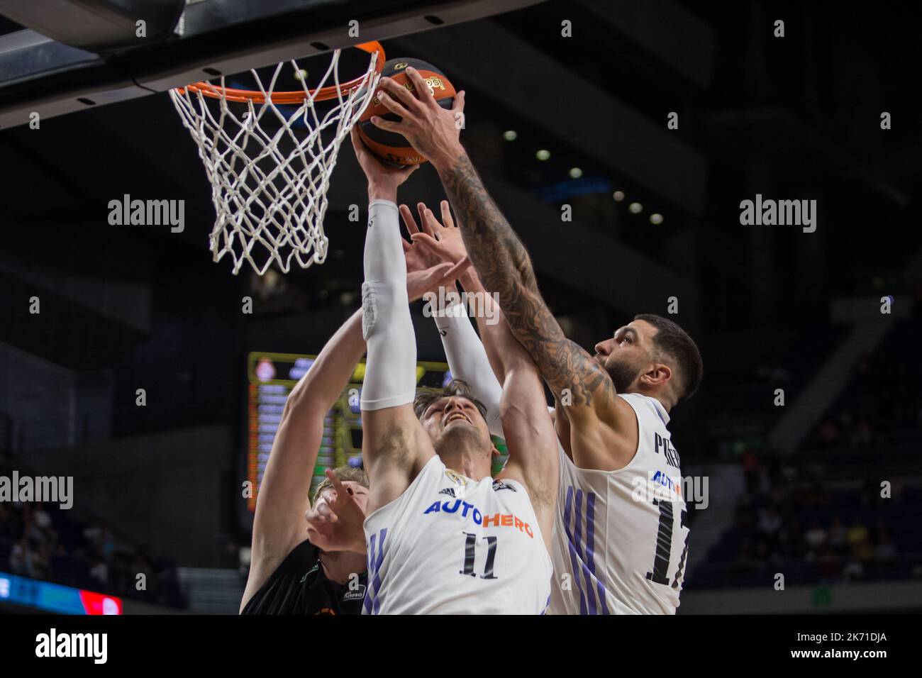 Madrid, Spain. 16th Oct, 2022. Mario Hezonja (C) and Vicent Poirier (R)during Real Madrid victory over Joventut Badalona 96 - 79 in Liga Endesa regular season game (day 4) celebrated in at WiZink Center (Madrid, Spain). October 16th 2022. (Photo by Juan Carlos García Mate/Pacific Press) Credit: Pacific Press Media Production Corp./Alamy Live News Stock Photo