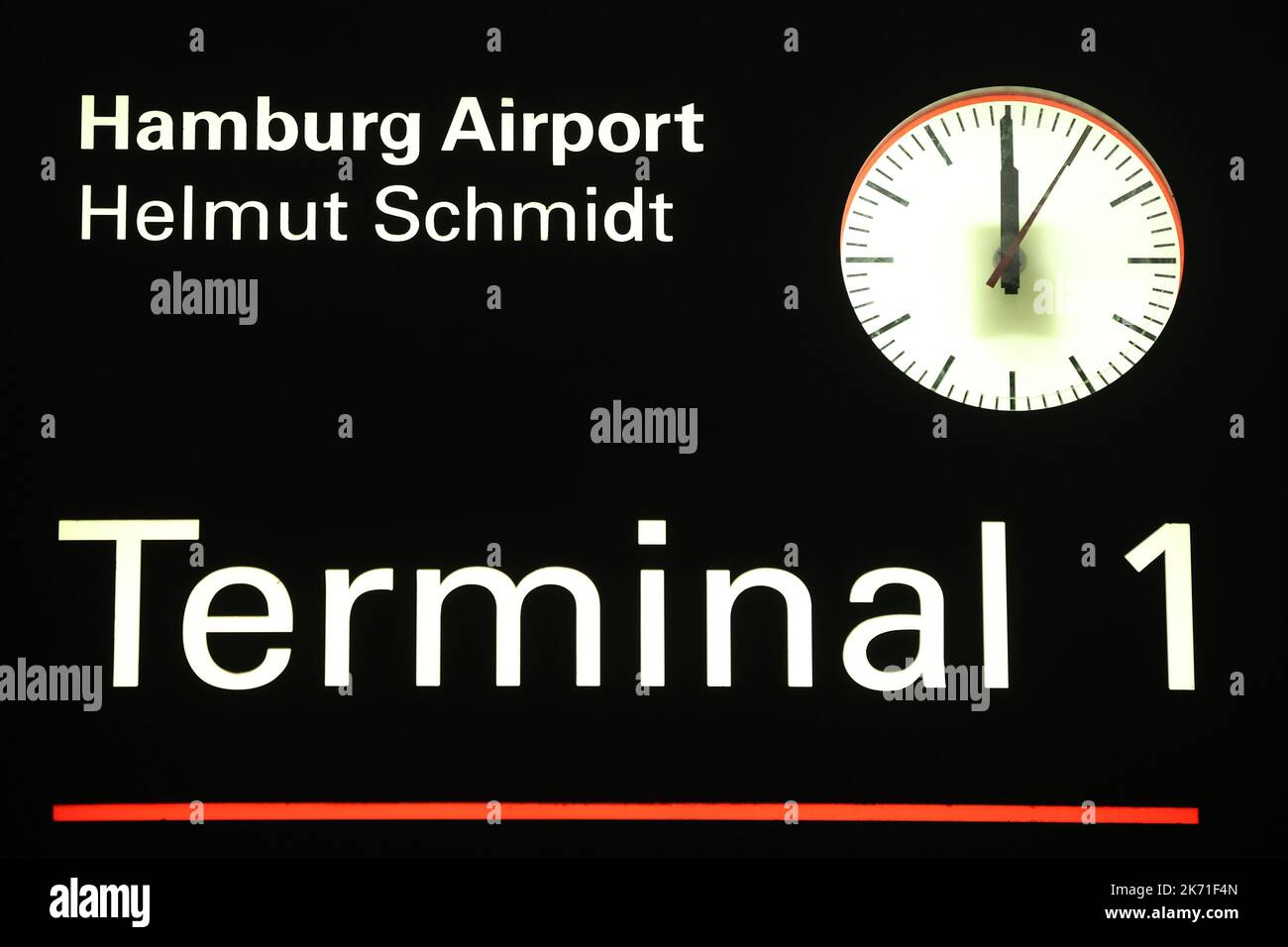 Hamburg, Germany. 16th Oct, 2022. The time 00.00 is displayed on a clock at Hamburg Airport, Terminal 1. The Vereinigung Cockpit union has called on Eurowinds pilots to walk off the job from 00:00 on Monday, (Oct. 17) to Wednesday (Oct. 19) inclusive. The industrial action has begun as planned, said a spokesman for the Vereinigung Cockpit (VC) pilots' union. No further offer had been submitted. Credit: Bodo Marks/dpa/Alamy Live News Stock Photo