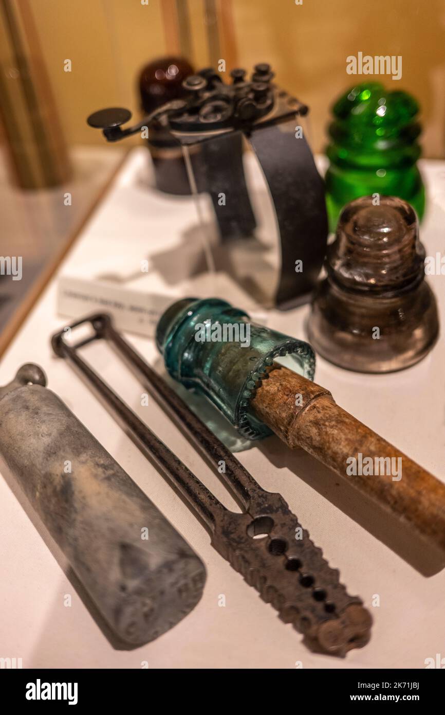 tools used to build electrical lines for telegraph machines to carry communication Stock Photo