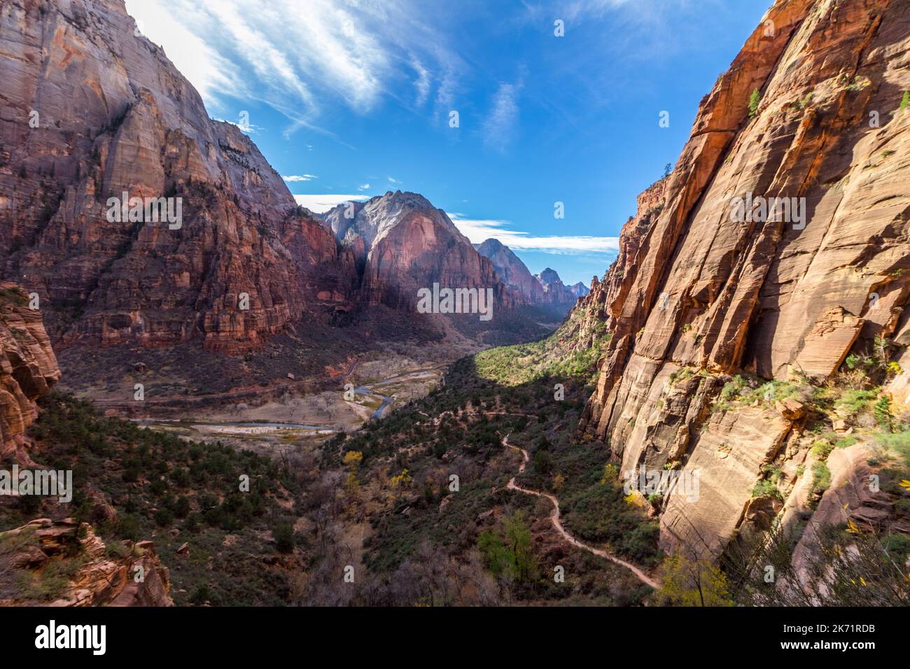 View of Zion Canyon from a winding hiking trail high above the canyon on a sunny November day in Zion National Park, Utah, USA Stock Photo