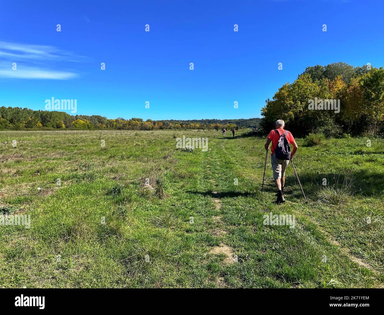 Senior man walking along country hi-res stock photography and images ...