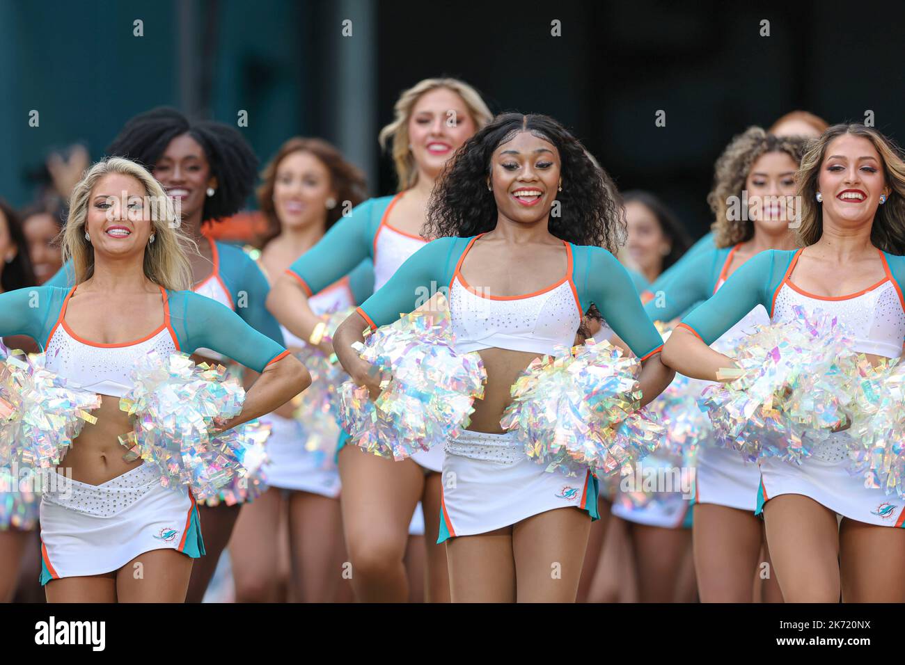 Sunday, October 16, 2022; Miami Gardens, FL USA;  The Miami Dolphins cheerleaders prepare to lead the team out to the playing field during an NFL game Stock Photo