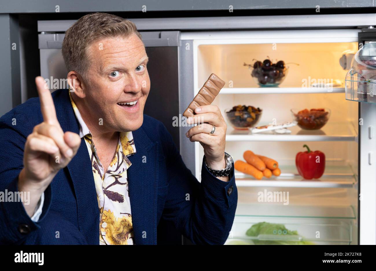 EDITORIAL USE ONLY Wine expert Olly Smith demonstrates one of the rules