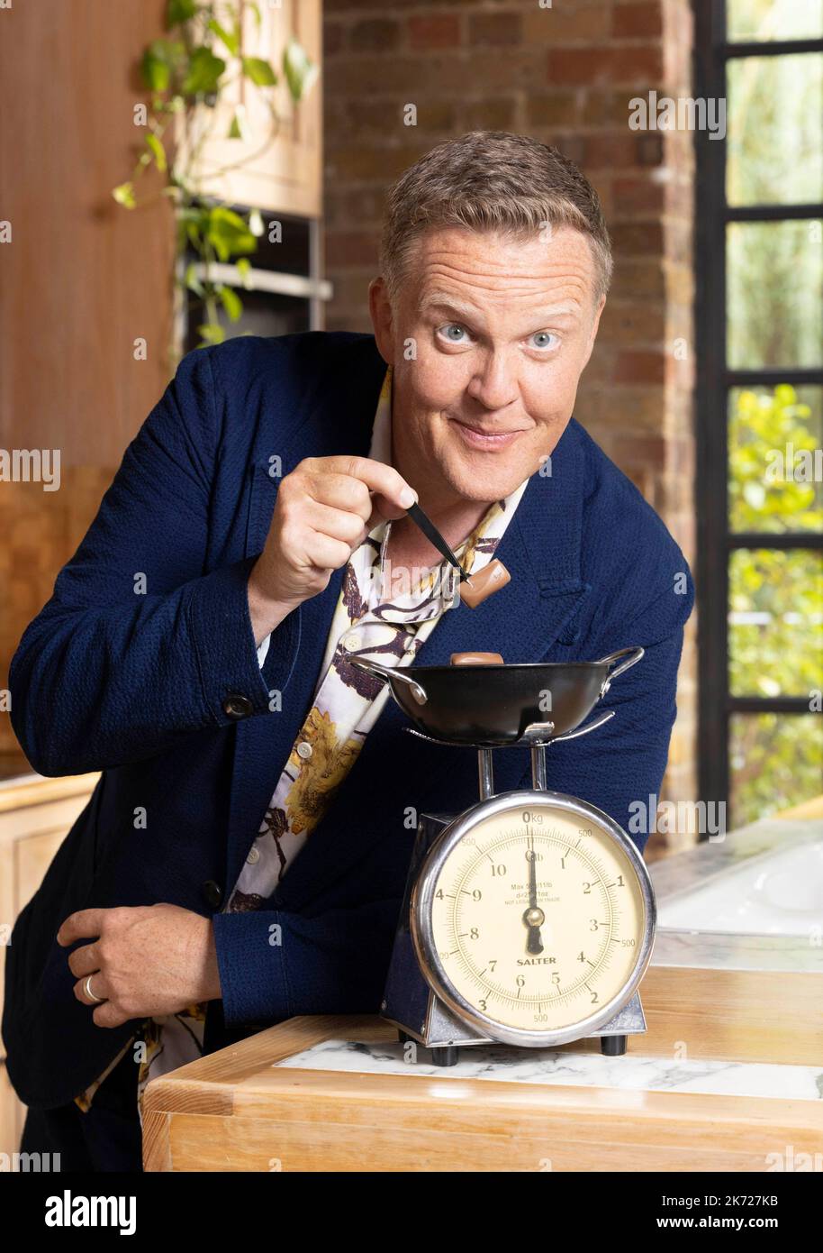 EDITORIAL USE ONLY Wine expert Olly Smith demonstrates one of the rules