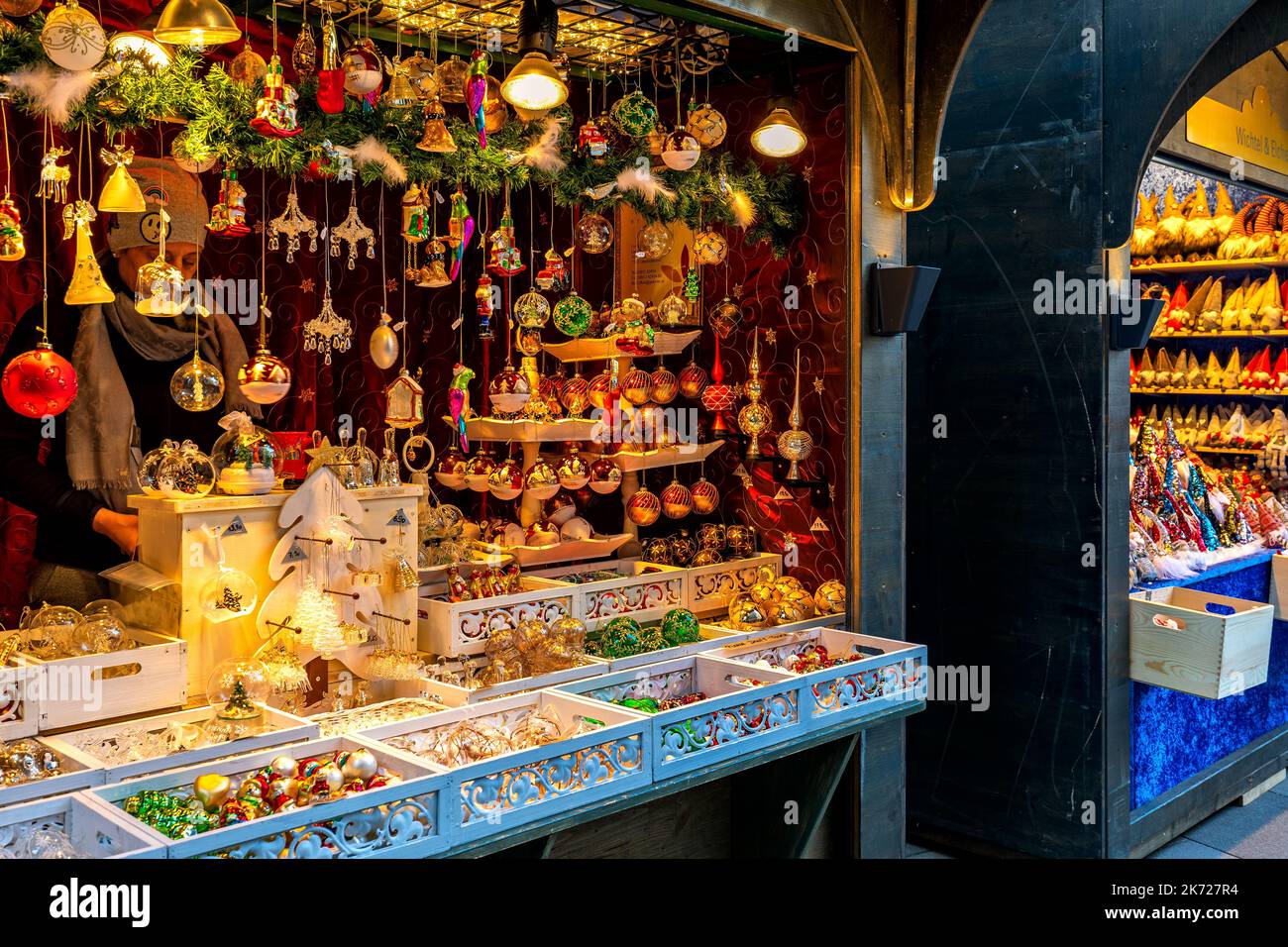 Handmade glass Christmas decorations on sale at street kiosk during famous traditional Christmas market in Vienna, Austria. Stock Photo