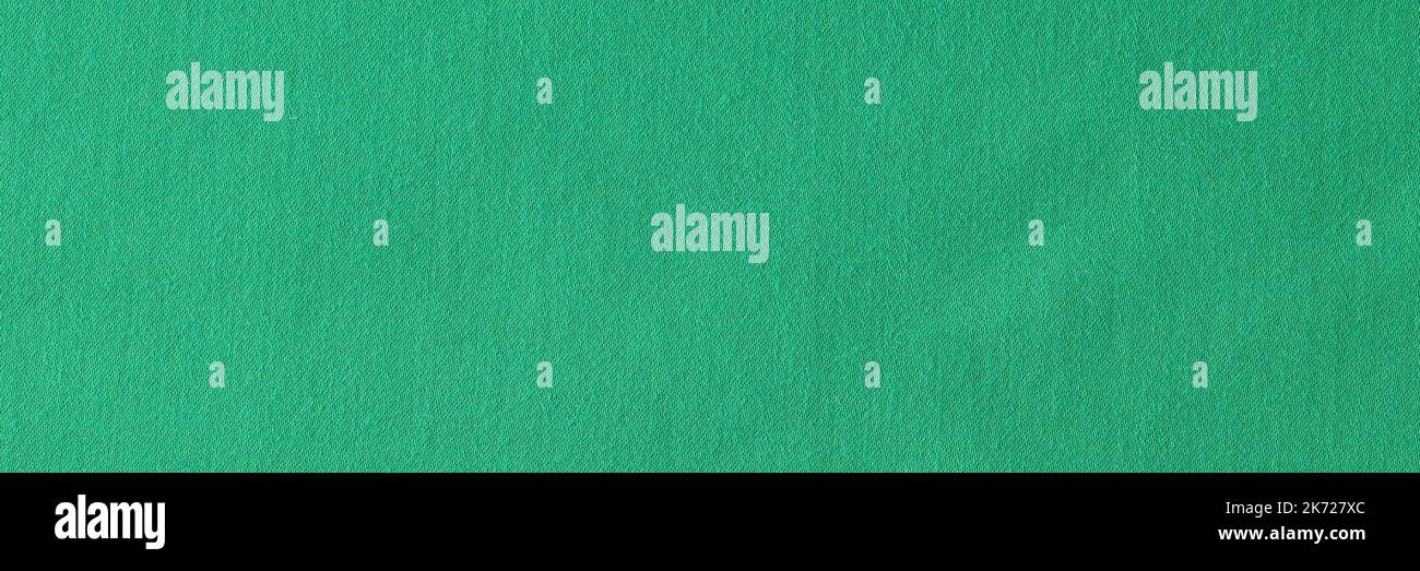 Poker table felt background in green color Stock Photo Alamy