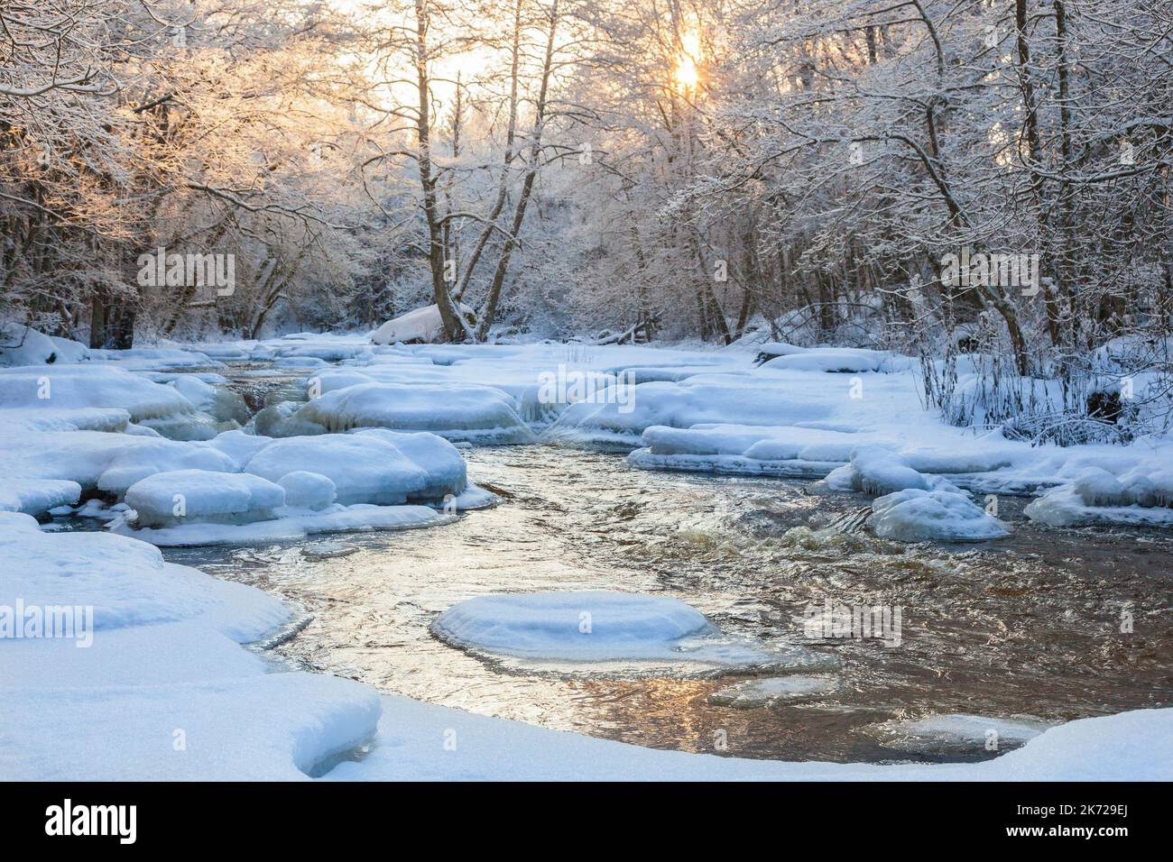 Snowy stream frozen water hi-res stock photography and images - Alamy