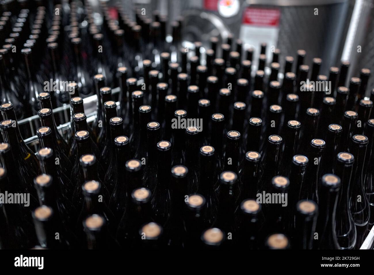 Wine bottles at winery production top view Stock Photo Alamy