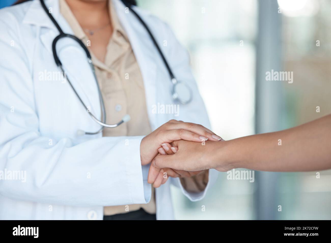 Well get through this together. a doctor giving a patient support Stock ...